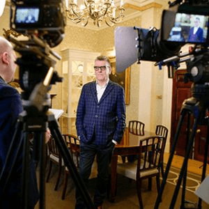 Videographers filming a corporate interview in London